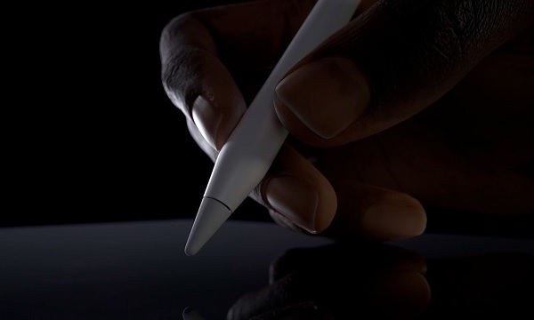 A close-up of a hand holding a stylus

Description automatically generated