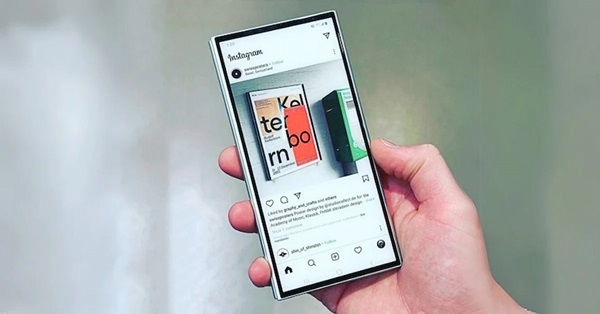 A hand holding a cell phone
Description automatically generated