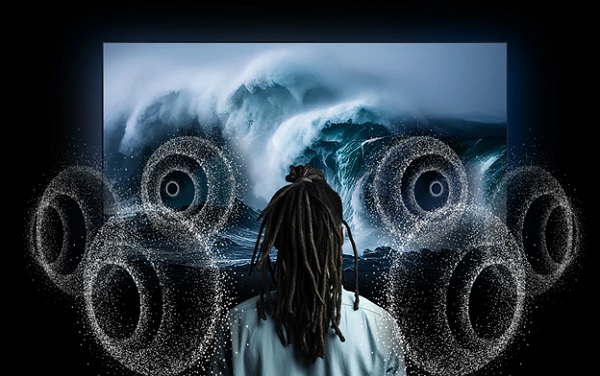 A person looking at a large screen
Description automatically generated