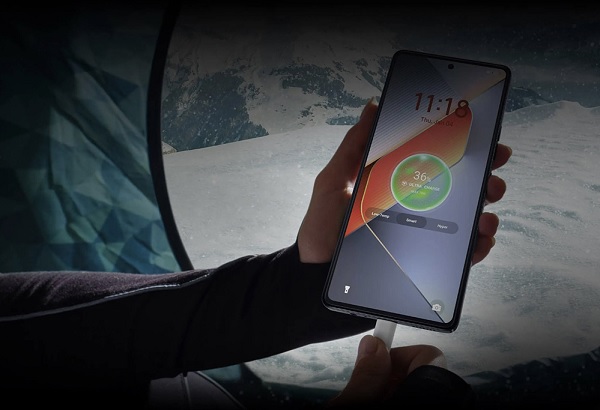 A cell phone and accessories on a table
Description automatically generated