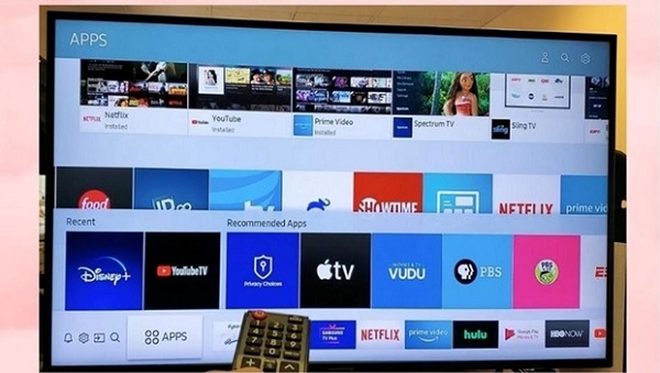 A television with a remote control

Description automatically generated