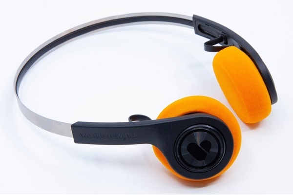 A pair of yellow and black headphones

Description automatically generated