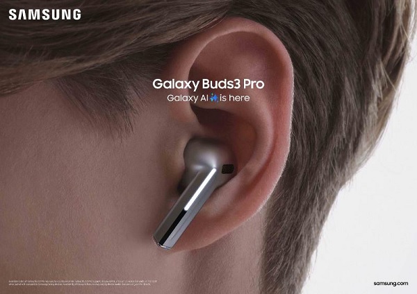 A pair of earbuds with black rubber caps

Description automatically generated