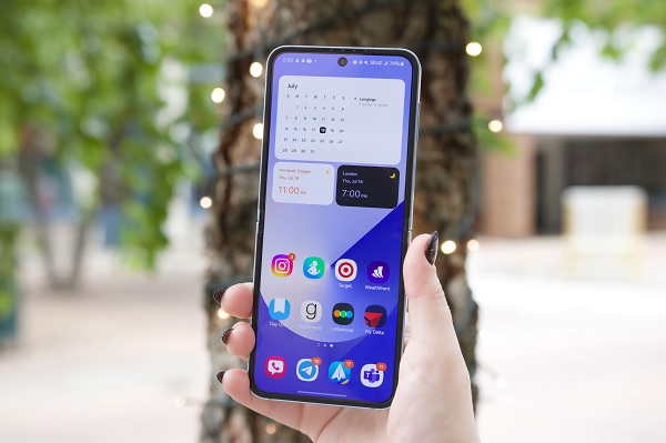 A smart phone on a book
Description automatically generated