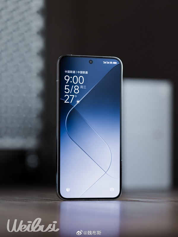 A cell phone on a table
Description automatically generated