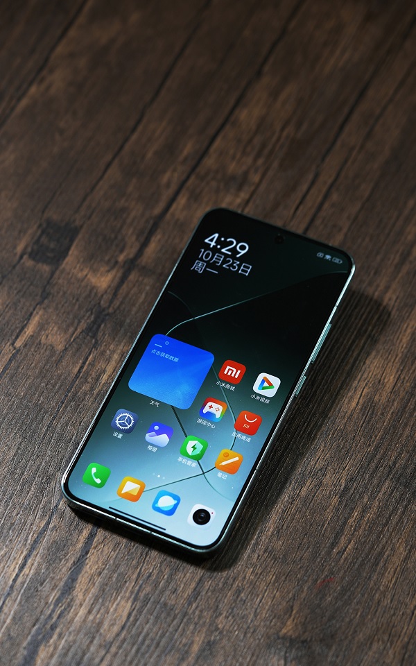 A cell phone on a table
Description automatically generated