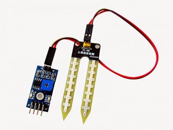 A small electronic device with wires

Description automatically generated