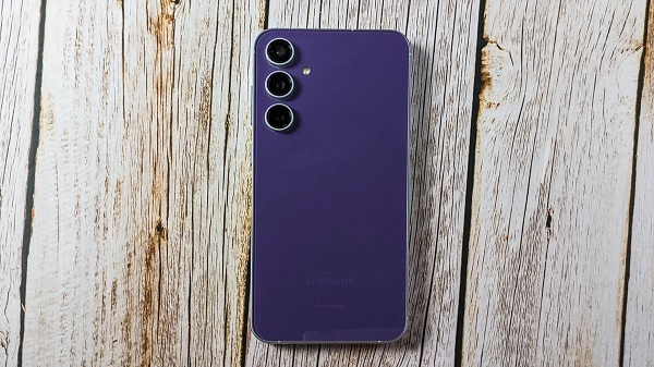 A purple cell phone with three lenses

Description automatically generated