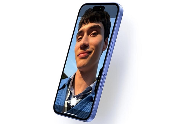 A cell phone with a person's face on the screen

Description automatically generated