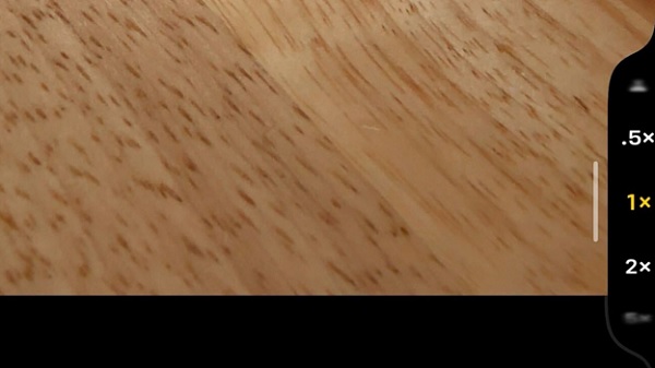 A close-up of a wood grain

Description automatically generated