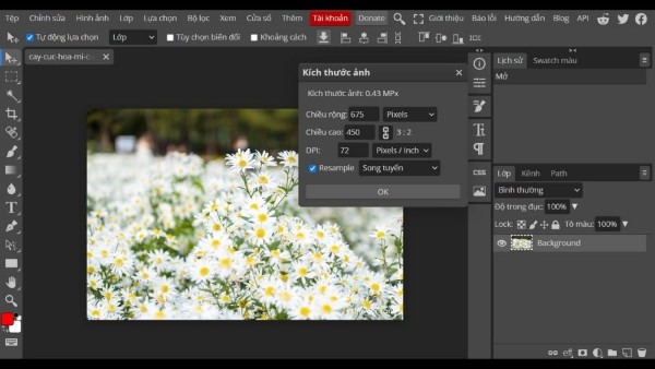 Chọn công cụ "Crop Tool" (hoặc nhấn phím C)